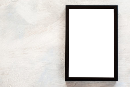 Blank photo frame on white background. Menu, recipes, greetings and memories concept, picture with...