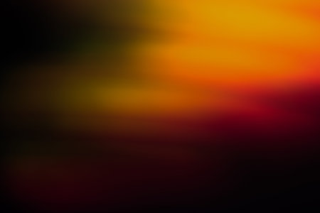 Abstract background of blurred orange, green and red light blur. Bokeh of defocused lines in motion,...