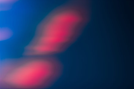 Abstract background of blurred red light spot. Aurora skylights wallpaper, shimmering glitter on...