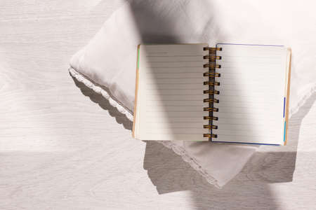 Author workplace. Comfy place top view. Creative open notebook closeup with free space, blogger workspace background, creativity conceptの写真素材