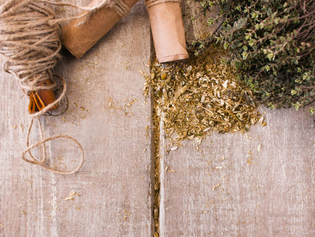Natural health herb background with free space. Herbal infusion closeup, messy workplace, herbage conceptの写真素材