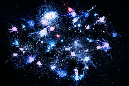 Professional cosmetics abstract background, star powder top view. Blue powdery eyeshadow and colourants for creative make upの写真素材