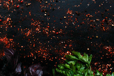 organic spice mix basil parsley dark backgroundの写真素材