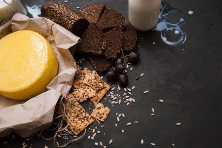 Rustic local dairy. Milk and cheese. Quality sort bread with bottles, free space. Upmarket produces...