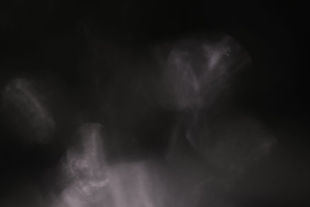 Real Lens flare light effect. Sparkle ray leak on black background. Optical effect of spotlight....