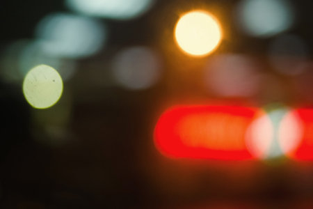 Bokeh blurring urban colours concept. Abstract background. Defocused lights. Shiny spots.