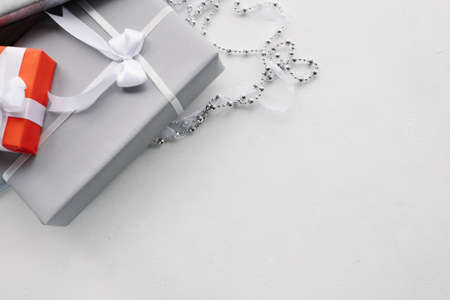luxury jewelry gifts for top class on grey background. professional present wrapping for toffs on birthday, new year, christmas, thanksgiving, valentines day and other holidays.の写真素材