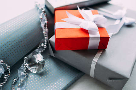 luxury jewelry gifts for top class on grey background. professional present wrapping for toffs on birthday, new year, christmas, thanksgiving, valentines day and other holidays.の写真素材