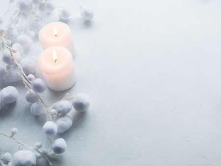 candles on white background. winter decor. coziness spa conceptの写真素材