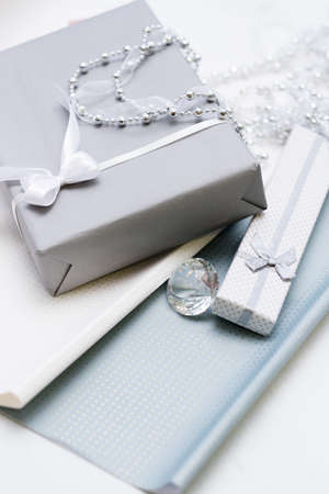 Gift boxes with jewelry presents inside. Tasteful wrapping conceptの写真素材