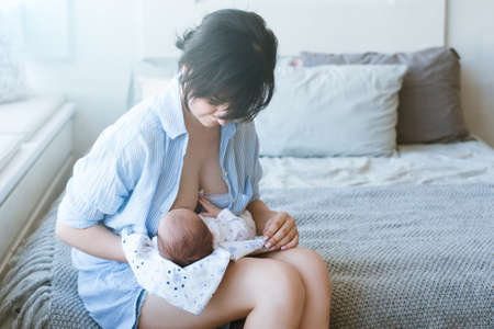 benefits of breastfeeding for newborns. happy motherhood. family values.の写真素材