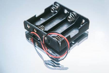 disassembled electric accumulator on white background. batteries charging .device for energy storage...