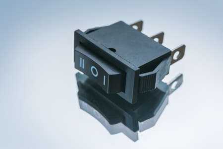 switch on off button on white background. principle of operation of single key light switchesの写真素材