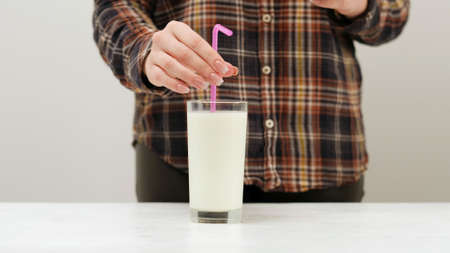 Natural fresh milkshake drink. A pretend cocktail party for people of healthy lifestyle.の写真素材