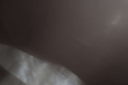 illuminated burst of light. lens flare shine effects. creative backgroundの写真素材