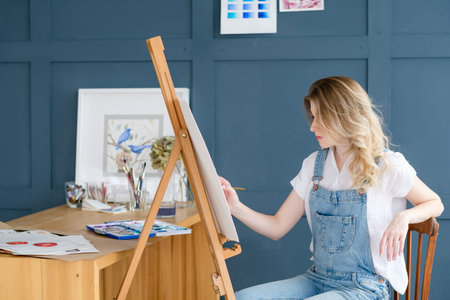 art therapy. painting classes or courses. creativity inspiration expression concept. woman drawing a...