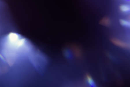 lens flare. colorful abstract blur bokeh light. dark backgroundの写真素材