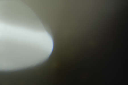 bright flashes optical lens flare creative photography art style. black backgroundの写真素材