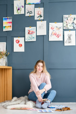 creative leisure. painting hobby. artful personality. watercolor drawings hanging on the wall