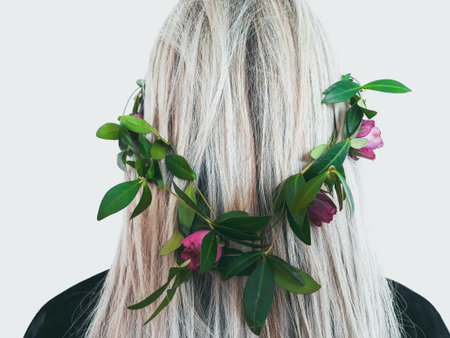 green natural shampoo. organic hair products. beauty and health. herbal cosmetics. wreath of flowers and leaves in womans hairの写真素材