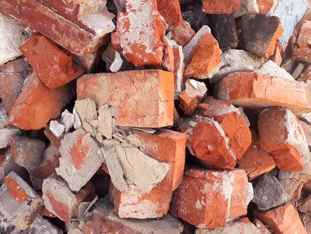 red brick background. scattered old broken shabby blocks. copy space concept