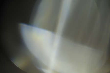 illuminated burst of light. lens flare shine effects. creative backgroundの写真素材