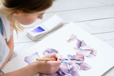 art hobby creativity. floral design. drawing of a purple flowers and petals. watercolor pictureの写真素材