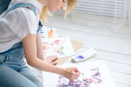 art painting hobby. creative leisure. girl drawing a picture. talent inspiration creation and self expression conceptの写真素材
