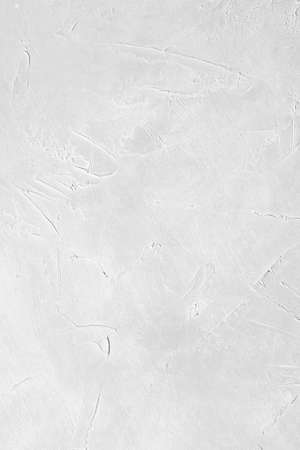 abstract distressed decor background. textured white scratched plaster design. free space conceptの写真素材
