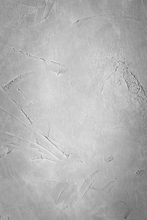 abstract art grey textured dust background. distressed dark scratched design. dark edges vignette effect. free space conceptの写真素材