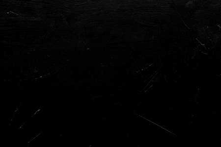 abstract design black textured background. distressed dark scratched weathered backdrop. copy space conceptの写真素材