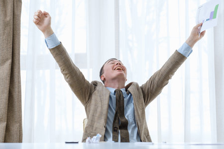 winner champion victory. successful deal. career achievement. happy laughing business man with his...