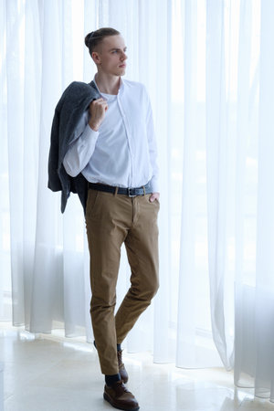 serious confident purposeful ambitious young business man. casual stylish formal wear. office fashionistの写真素材