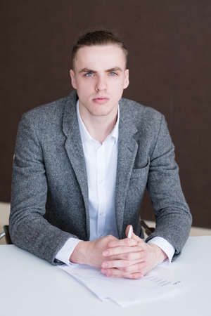 determined concentrated serious business man. modern smart professional office worker.の写真素材