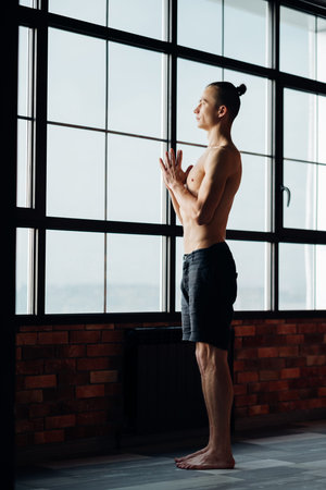 yoga training. sport and fitness. wellness lifestyle and regular gym workout. man resting and...
