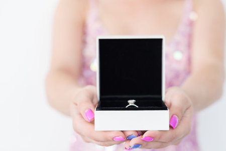 engagement ring in a gift box. wedding jewelry marriage and happiness concept. precious romantic...