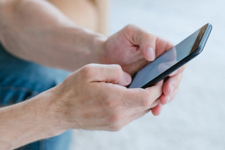 idle lifestyle and leisure. internet and social network addiction. mobile online shopping. man using...