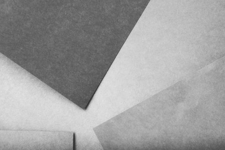 paper layers. minimalistic abstract background with copyspace. light and dark grey sheets collage.の写真素材