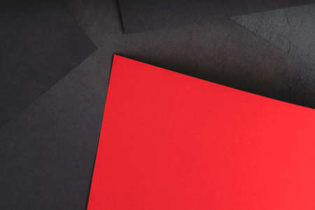 paper layers. black sheets with contrast red accent. abstract geometric background with copy space.の写真素材