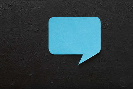 empty speech bubble on black background. icon of social media communication and ideasの写真素材