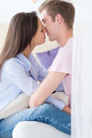 couple cuddling. man and woman tender moments. love affection and emotion concept.の写真素材