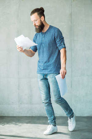man reading documents. legal agreement contract and business paperwork concept.の写真素材
