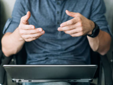 online job interview. man talking to hr laptop through video callの写真素材