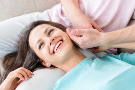 man hand caressing woman face. affection and tenderness.の写真素材