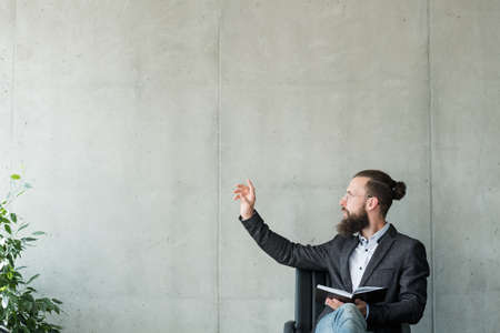 man touching virtual object. digital interface business conceptの写真素材