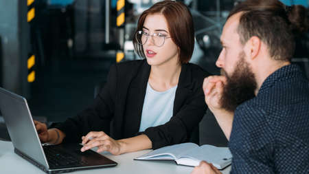 man and woman discussing business. office coworkers communication and teamwork