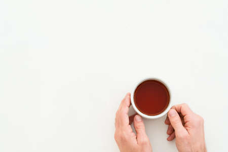 Breakfast cup of tea. Lifestyle concept. Copy space on white background.の写真素材