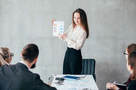 Sale analysis. Growth rate presentation. Finacial analyst presenting teamwork results.の写真素材