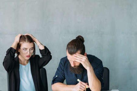 Business strategy failure. Troubleshooting meeting. Concerned team colleagues thinking hard. Copy...