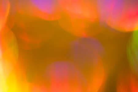 Blurred neon lights. Abstract lens flare effect background. Bokeh illuminated glow.